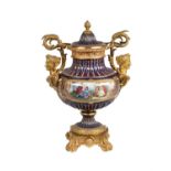 A French porcelain and gilt metal mounted urn and cover in Sevres style