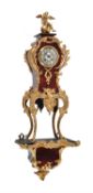 Y A French gilt metal and scarlet tortoiseshell mantel clock in Rococo style