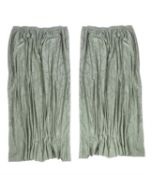 A pair of pale green damask curtains