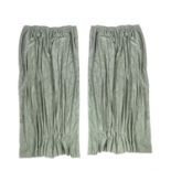 A pair of pale green damask curtains