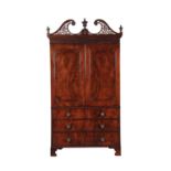 A mahogany linen press