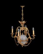 A gilt metal and moulded glass four light chandelier