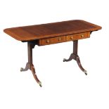 A Regency mahogany and satinwood sofa table
