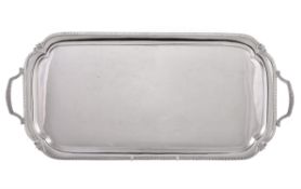 A silver twin handled drinks tray by Harrison Brothers & Howson