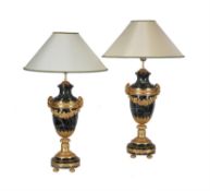 A pair of French green serpentine marble and gilt metal mounted table lamps in Louis XVI style