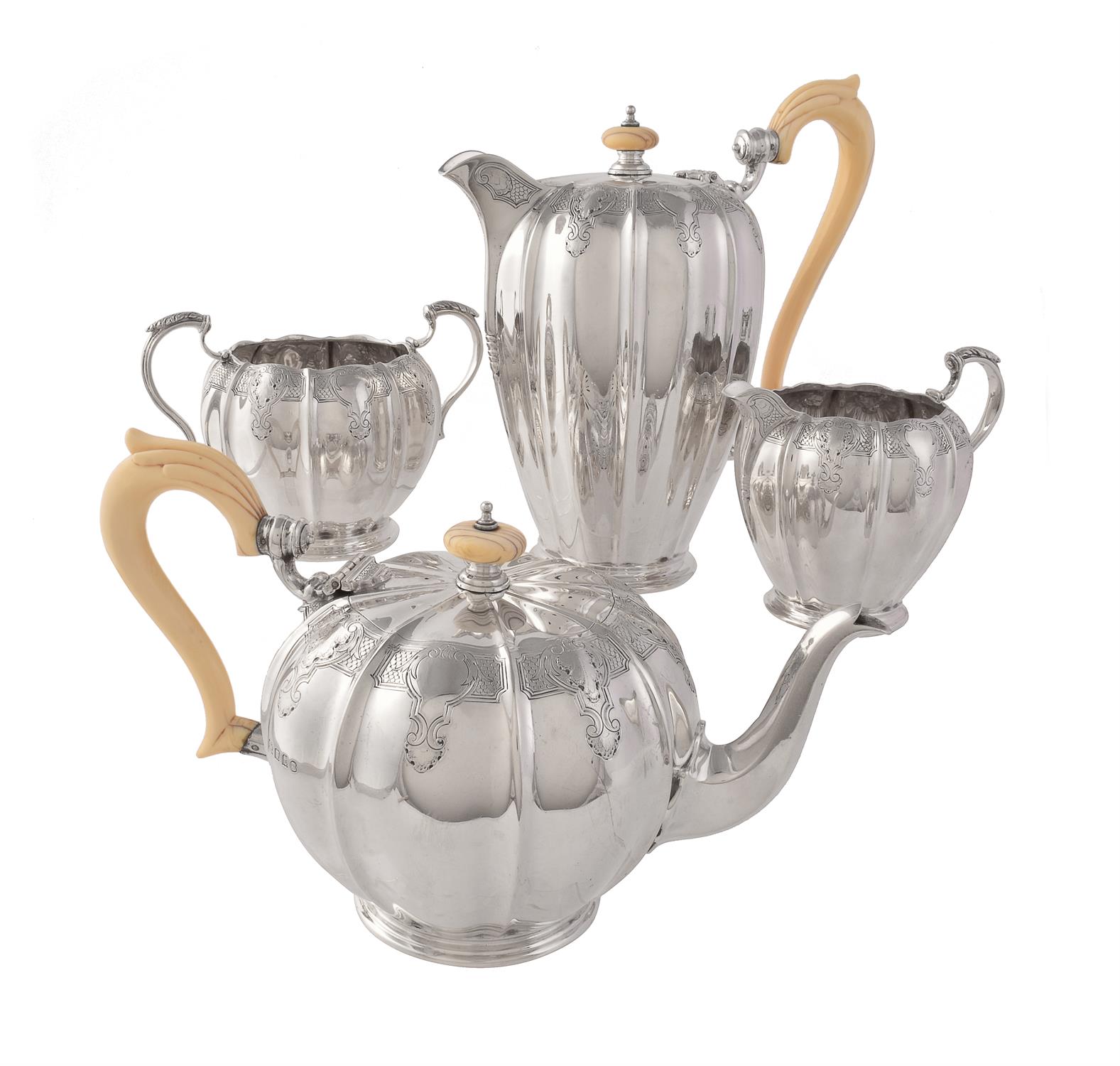 Y A silver melon shaped four piece tea service by The Goldsmiths & Silversmiths Co. Ltd