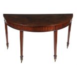 A pair of George III mahogany side tables