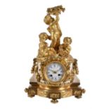 A late 19th century ormolu and white marble mantel clock