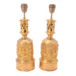 A pair of brass table lamps