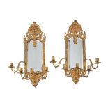 A pair of French gilt metal five light girandoles