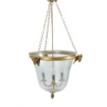 A gilt-metal and glazed hall lantern in the manner of Regency Hundi lights