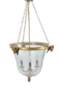 A gilt-metal and glazed hall lantern in the manner of Regency Hundi lights
