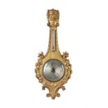 A Victorian carved giltwood and gesso wheel barometer