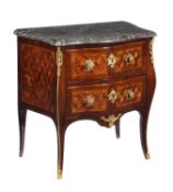 Y A French rosewood, parquetry inlaid, and gilt metal mounted petite commode