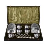 A set of six French silver mounted porcelain coffee cups and saucers by Edouard Ernie