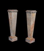 A pair of Continental Sarrancolin marble pedestals