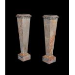 A pair of Continental Sarrancolin marble pedestals