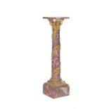A French Fleur de Pecher and gilt bronze mounted columnar pedestal