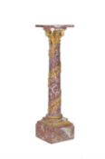 A French Fleur de Pecher and gilt bronze mounted columnar pedestal