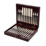 A set of eighteen Scottish silver old English thread pattern fruit knives and forks by Hamilton & In