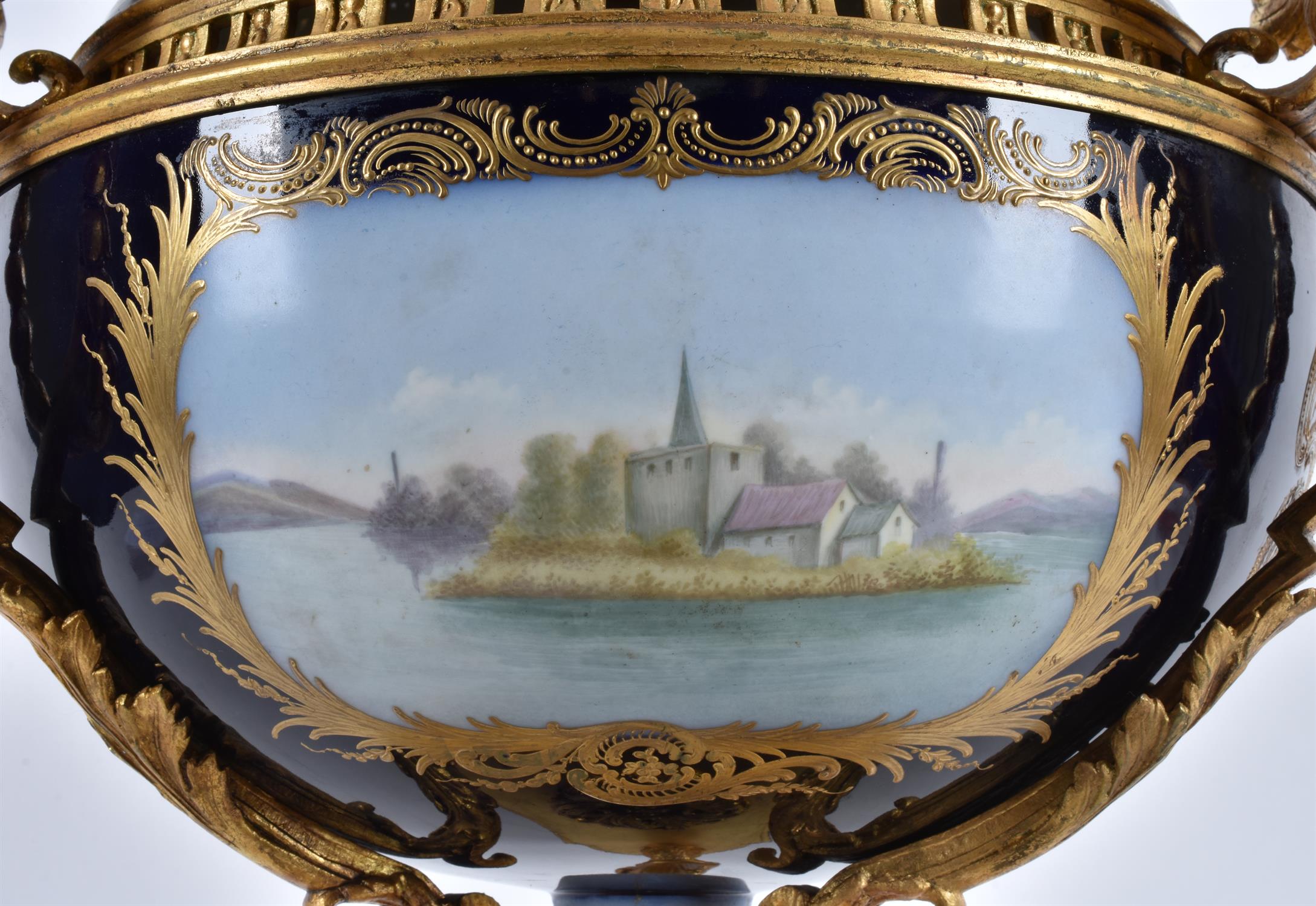 A Sevres-style porcelain blue-ground and gilt-metal mounted three-handled pot pourri urn and cover - Image 5 of 9