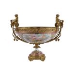 A French Sevres-style porcelain and gilt bronze mounted twin-handled pedestal centrepiece