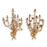 A pair of French gilt metal nine light wall appliques in Louis XV style