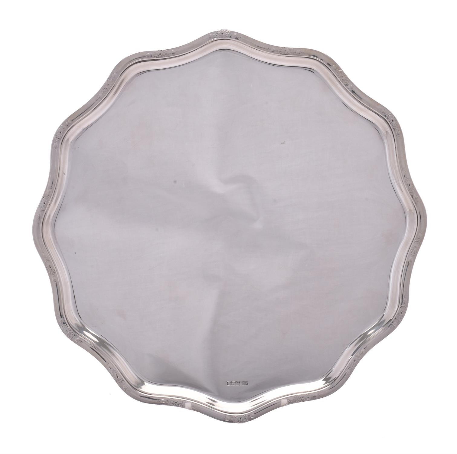 A silver shaped circular salver by Frank Cobb & Co. Ltd