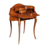 Y A French rosewood, amboyna, and box strung lady's writing table