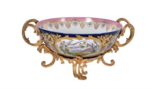 A French porcelain and gilt metal mounted twin-handled bowl