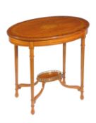 Y An Edwardian satinwood and marquetry oval occasional table