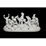 Attributed to Paul Brou, a Continental sculpted white marble Bacchanal