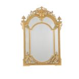 A pair of French carved two tone giltwood marginal wall mirrors