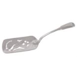 A George IV Irish silver fiddle pattern fish slice by Samuel Neville