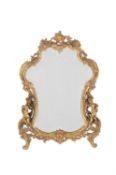 A gilt brass dressing mirror in Rococo style