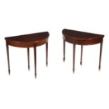 A near pair of mahogany and satinwood banded card tables in George III style