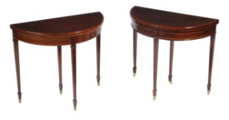 A near pair of mahogany and satinwood banded card tables in George III style