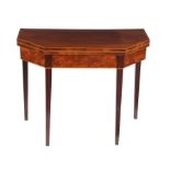 A George III mahogany and boxwood strung card table