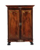 Y A George IV rosewood and brass inlaid cupboard or dwarf linen press