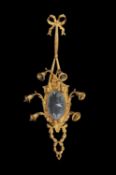 A set of four Rococo Revival gilt-metal and frosted glass wall lights