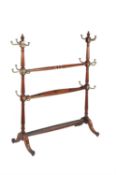 A late Victorian mahogany and brass hall stand