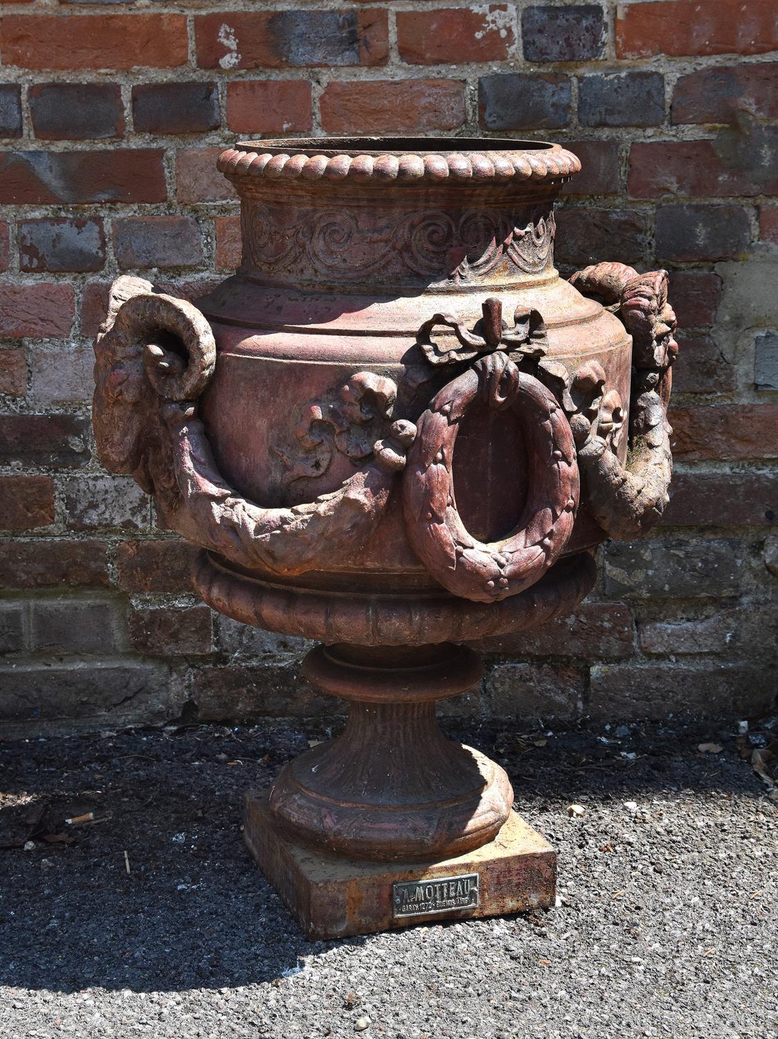 A painted cast iron garden urn by A. Motteau of Buenos Aires