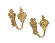 A set of eight pairs of gilt bronze curtain holdbacks by Beardmore