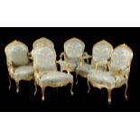 A set of six carved giltwood and upholstered fauteuils in Louis XV style