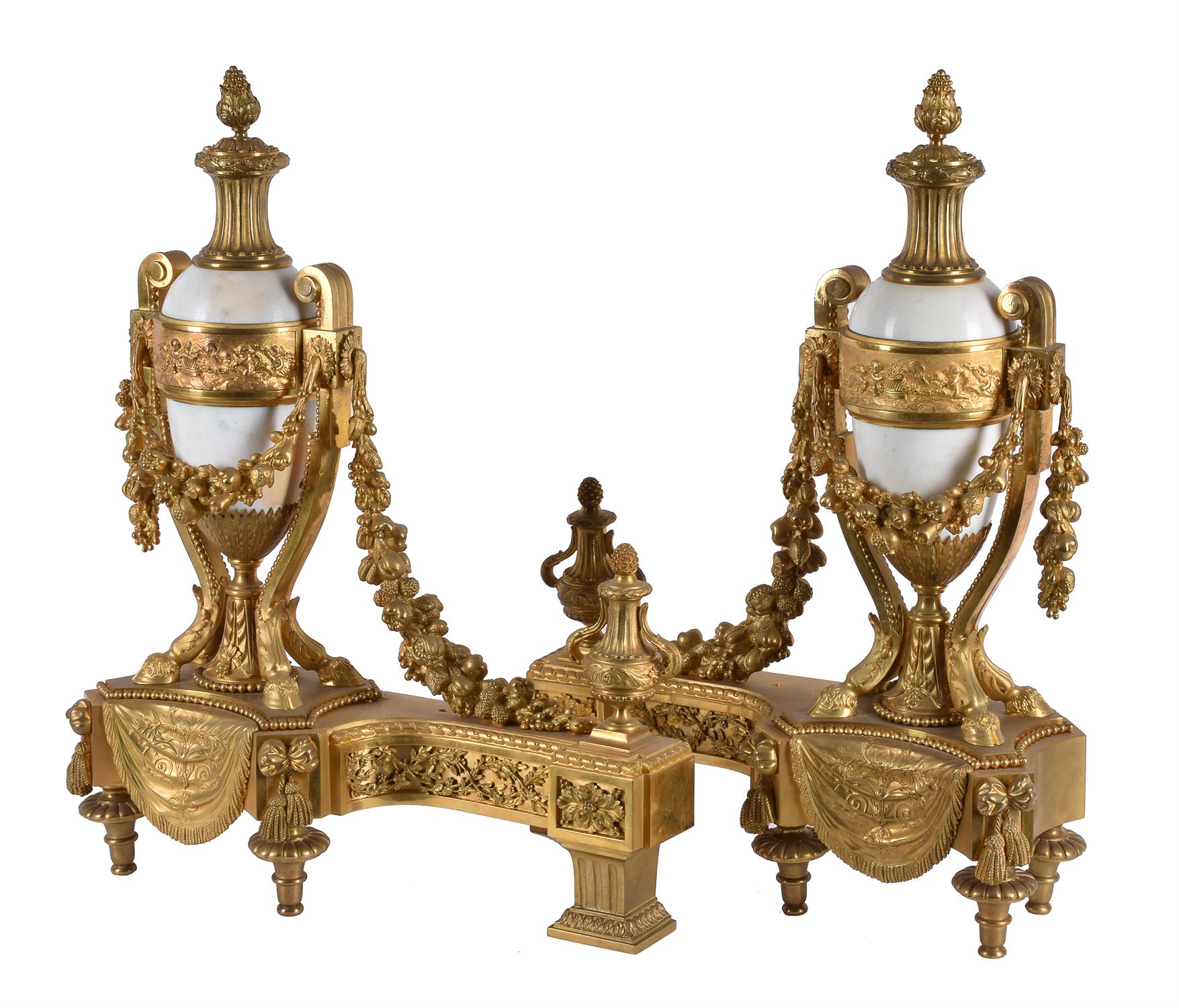 A pair of French gilt bronze and white marble mounted chenets in Louis XVI style - Image 2 of 2