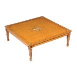 A satinwood low occasional table in Edwardian style