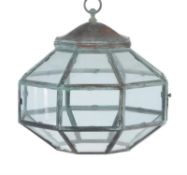A glazed copper hanging light of octagonal section