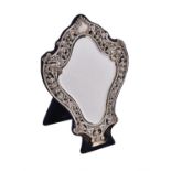A late Victorian silver cartouche shaped mirror by Samuel Jacob