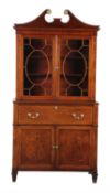 A late George III mahogany and box strung secretaire bookcase