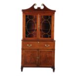 A late George III mahogany and box strung secretaire bookcase